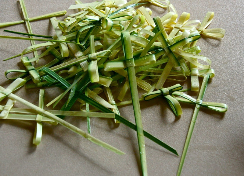 Cruz de palma de mano